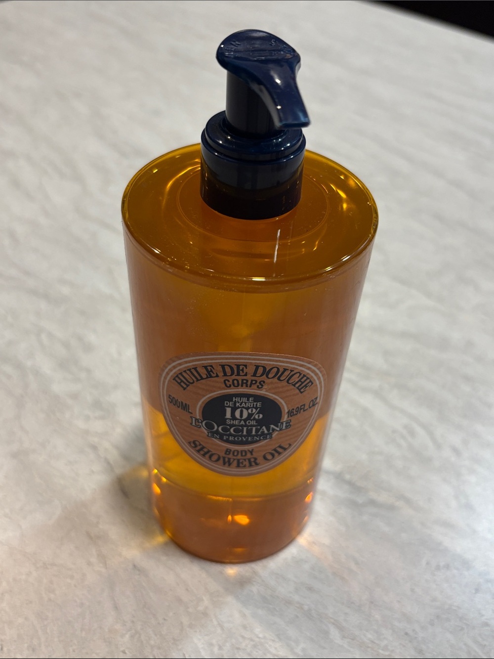 L'OCCITANE Shea Body Shower Oil - Amber Bottle with Dark Blue Pump